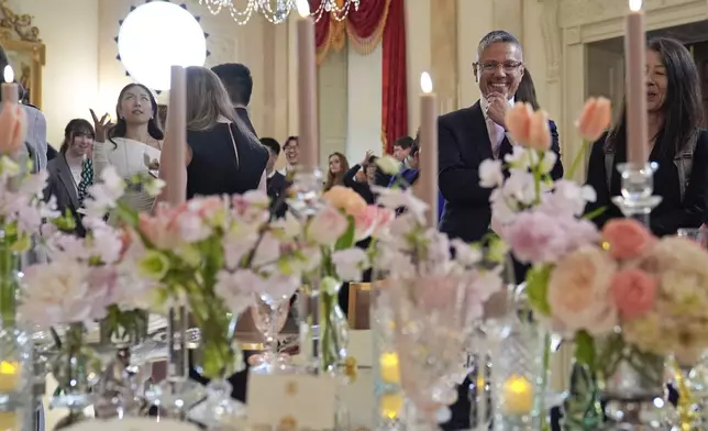 White House Social Secretary Carlos Elizondo, second from right, looks over the tables that are decorated during a press preview at the White House in Washington, Tuesday, April 9, 2024, for the State Dinner for Japan's Prime Minister Fumio Kishida on Wednesday. (AP Photo/Susan Walsh)