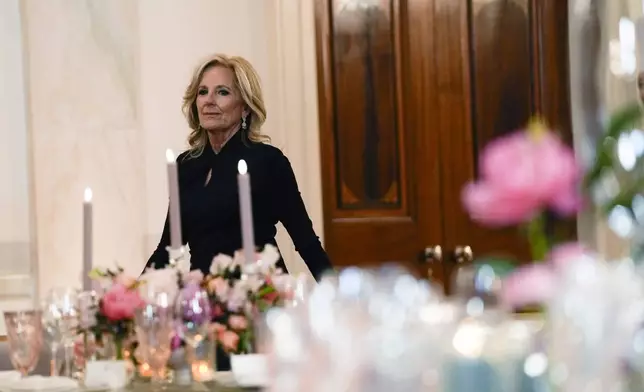 First lady Jill Biden arrives to speak before previewing the food and decorations at the White House in Washington, Tuesday, April 9, 2024, for the State Dinner for Japan's Prime Minister Fumio Kishida on Wednesday. (AP Photo/Susan Walsh)