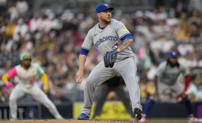 Toronto Blue Jays starting pitcher Yariel Rodriguez works against a San Diego Padres batter during the first inning of a baseball game, Friday, April 19, 2024, in San Diego. (AP Photo/Gregory Bull)