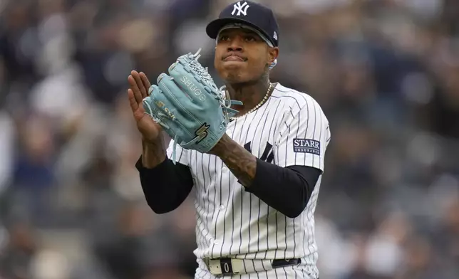 New York Yankees pitcher Marcus Stroman reacts after an out during the sixth inning of a baseball game against the Toronto Blue Jays at Yankee Stadium in New York, Friday, April 5, 2024. (AP Photo/Seth Wenig)