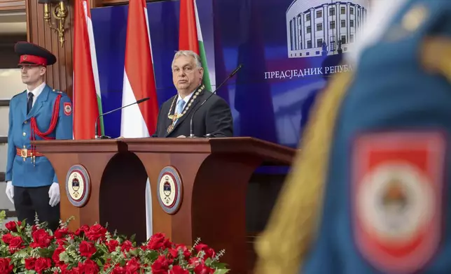 In this photograph made available by the Republika Srpska Presidential Press Service, Hungary's Prime Minister Viktor Orban speaks after receiving the Order of Republika Srpska from Bosnian Serb leader Milorad Dodik during his visit to Banja Luka, Bosnia, Friday, April 5, 2024. Orban is on a two-day visit to Bosnia and Herzegovina. (Republika Srpska Presidential Press Service via AP)