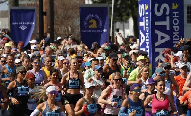 A wave of runners start the Boston Marathon, Monday, April 15, 2024, in Hopkinton, Mass. (AP Photo/Mary Schwalm)