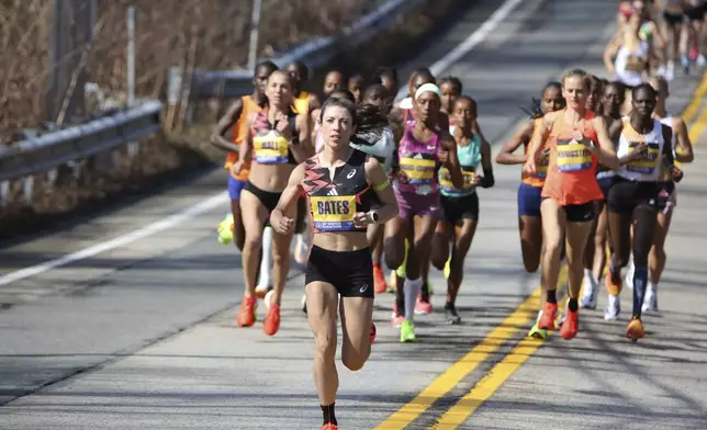 Emma Bates takes the lead after the start of the Boston Marathon, Monday, April 15, 2024, in Hopkinton, Mass. Bates was the top American finisher. (AP Photo/Jennifer McDermott)
