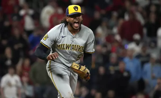 Milwaukee Brewers starting pitcher Freddy Peralta celebrates after striking out St. Louis Cardinals' Nolan Gorman with the bases loaded to end the sixth inning of a baseball game Friday, April 19, 2024, in St. Louis. (AP Photo/Jeff Roberson)