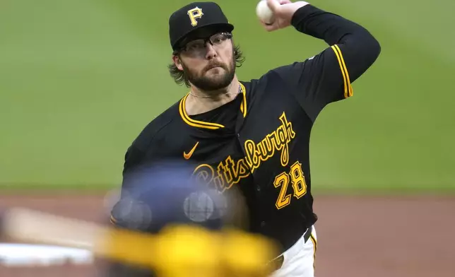 Pittsburgh Pirates starting pitcher Josh Fleming delivers during the first inning of a baseball game against the Milwaukee Brewers in Pittsburgh, Wednesday, April 24, 2024. (AP Photo/Gene J. Puskar)