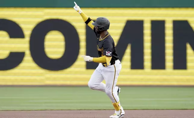 Pittsburgh Pirates' Andrew McCutchen runs the bases after hitting a home run against the Milwaukee Brewers during the first inning of a baseball game Tuesday, April 23, 2024, in Pittsburgh. (AP Photo/Matt Freed)
