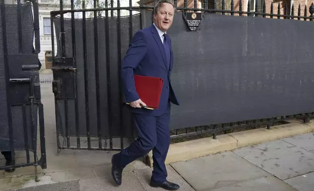 British Foreign Secretary David Cameron arrives in Downing Street for a Cabinet meeting, in London, Tuesday April 16, 2024. Cameron has urged Israel “to be smart as well as tough” and avoid striking back at Iran in response to its Saturday drone and missile barrage. (Yui Mok/PA via AP)