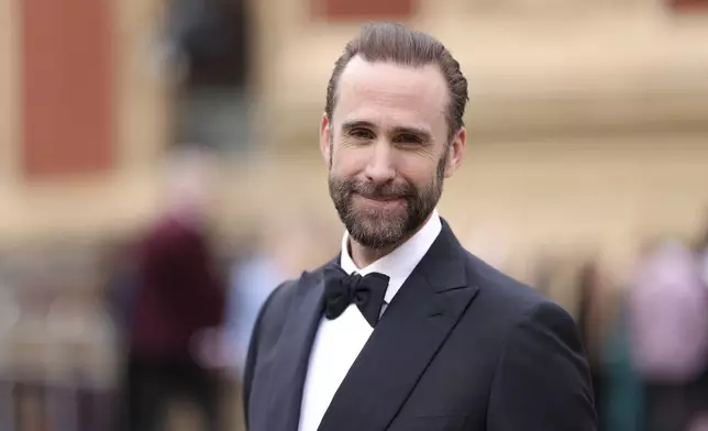 Joseph Fiennes poses for photographers upon arrival at the Olivier Awards on Sunday, April 14, 2024, in London. (Photo by Vianney Le Caer/Invision/AP)