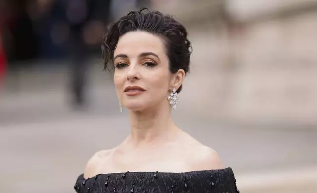 Laura Donnelly poses for photographers upon arrival at the Olivier Awards on Sunday, April 14, 2024, in London. (Photo by Vianney Le Caer/Invision/AP)
