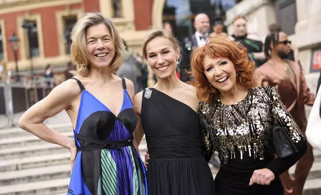 Janie Dee, from left, Joanna Riding and Bonnie Langford pose for photographers upon arrival at the Olivier Awards on Sunday, April 14, 2024, in London. (Photo by Vianney Le Caer/Invision/AP)