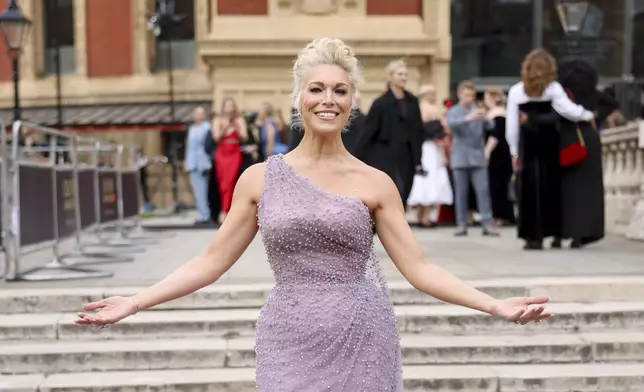 Hannah Waddingham poses for photographers upon arrival at the Olivier Awards on Sunday, April 14, 2024, in London. (Photo by Vianney Le Caer/Invision/AP)