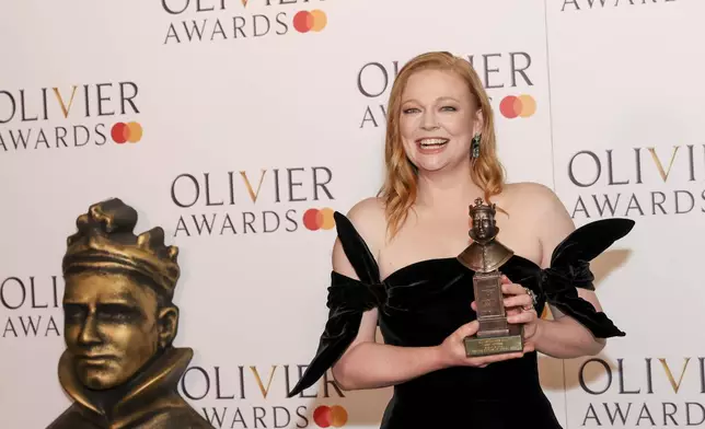 Sarah Snook, winner of the best actress award for "The Picture Of Dorian Gray", poses for photographers in the winner's room during the Olivier Awards on Sunday, April 14, 2024, in London. (Photo by Vianney Le Caer/Invision/AP)