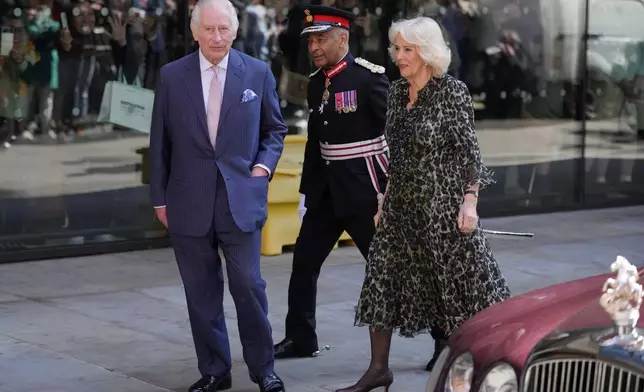Britain's King Charles III and Queen Camilla arrive for a visit to University College Hospital Macmillan Cancer Centre in London, Tuesday, April 30, 2024. The King, Patron of Cancer Research UK and Macmillan Cancer Support, and Queen Camilla visited the University College Hospital Macmillan Cancer Centre, meeting patients and staff. This visit is to raise awareness of the importance of early diagnosis and will highlight some of the innovative research, supported by Cancer Research UK, which is taking place at the hospital. (AP Photo/Kin Cheung)