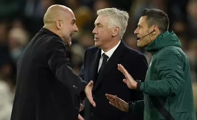 Manchester City's head coach Pep Guardiola argues with the fourth official as Real Madrid head coach Carlo Ancelotti looks on during the Champions League quarterfinal second leg soccer match between Manchester City and Real Madrid at the Etihad Stadium in Manchester, England, Wednesday, April 17, 2024. (AP Photo/Dave Thompson)