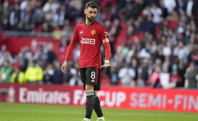 Manchester United's Bruno Fernandes reacts during a penalty shootout at the end of the English FA Cup semifinal soccer match between Coventry City and Manchester United at Wembley stadium in London, Sunday, April 21, 2024. (AP Photo/Alastair Grant)