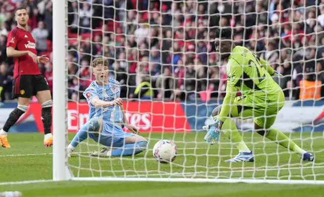 Coventry City's Victor Torp Overgaard, centre, makes an attempt to score during the English FA Cup semifinal soccer match between Coventry City and Manchester United at Wembley stadium in London, Sunday, April 21, 2024. (AP Photo/Alastair Grant)
