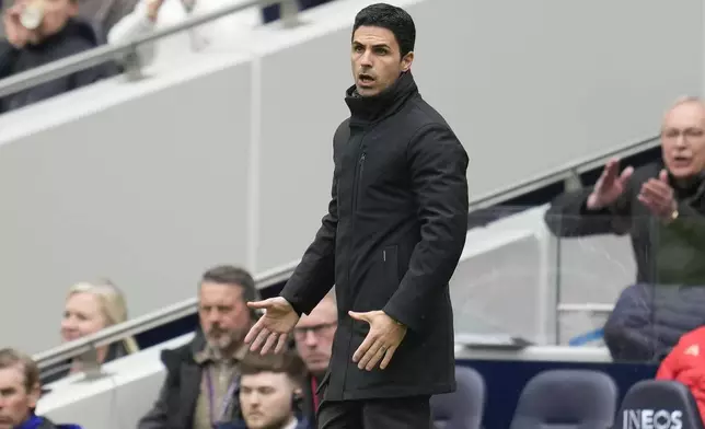 Arsenal's manager Mikel Arteta gestures during the English Premier League soccer match between Tottenham Hotspur and Arsenal at the Tottenham Hotspur Stadium in London, England, Sunday, April 28, 2024. (AP Photo/Kin Cheung)