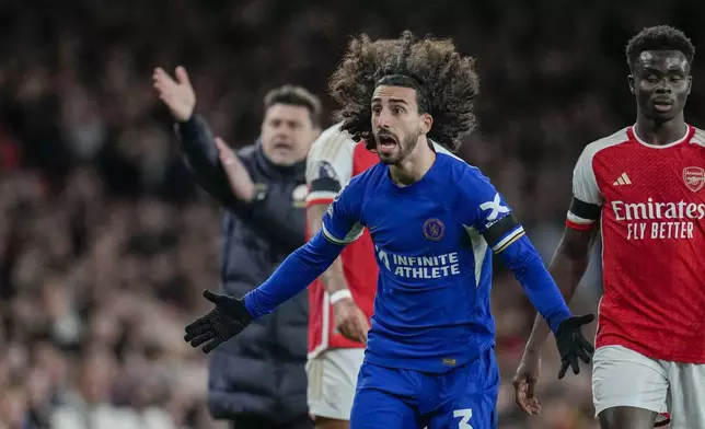 Chelsea's Marc Cucurella, center, reacts during the English Premier League soccer match between Arsenal and Chelsea at Emirates Stadium in London, Tuesday, April 23, 2024. (AP Photo/Kin Cheung)