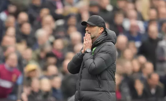 Liverpool's manager Jurgen Klopp reacts during the English Premier League soccer match between West Ham United and Liverpool at London stadium in London, Saturday, April 27, 2024. (AP Photo/Kin Cheung)