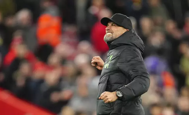 Liverpool's manager Jurgen Klopp celebrates at the end of the English Premier League soccer match between Liverpool and Sheffield United at the Anfield stadium in Liverpool, England, Thursday, Apr. 4, 2024. (AP Photo/Jon Super)