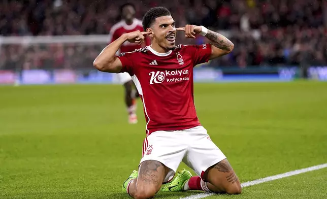 Nottingham Forest's Morgan Gibbs-White celebrates scoring their side's third goal during the English Premier League soccer match between Nottingham Forest and Fulham at the City Ground, in Nottingham, England, Tuesday, April 2, 2024. (Bradley Collyer/PA via AP)