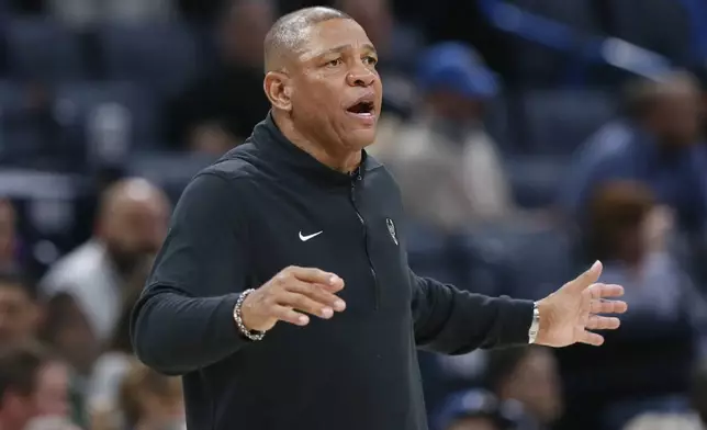 Milwaukee Bucks coach Doc Rivers instructs his team during the second half of his team's NBA basketball game against the Oklahoma City Thunder, Friday, April 12, 2024, in Oklahoma City. (AP Photo/Nate Billings)