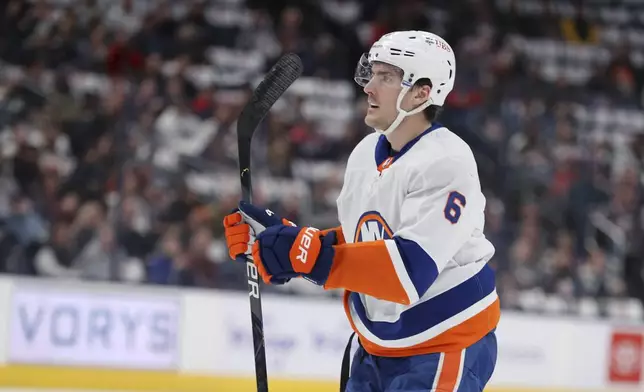 CORRECTS TO APRIL NOT MARCH - New York Islanders defenseman Ryan Pulock (6) celebrates after a goal during the first period of an NHL hockey game against the Columbus Blue Jackets, Thursday, April 4, 2024, in Columbus, Ohio. (AP Photo/Joe Maiorana)