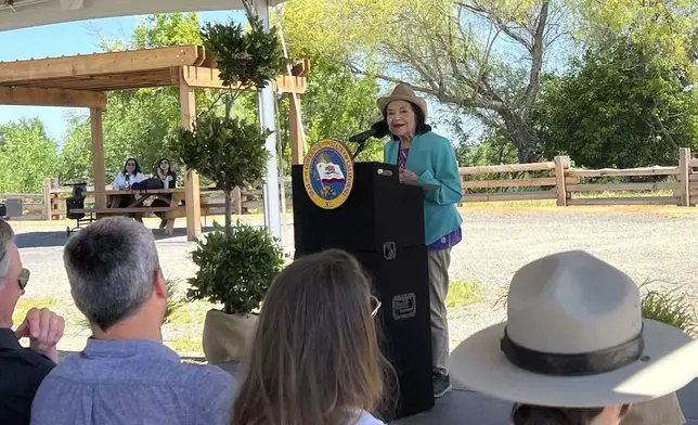 Civil Rights activist Dolores Huerta speaks during a ground breaking ceremony where the state will open its first new state park in a decade at the Dos Rios property, in Modesto, Calif. on Monday April 22, 2024. The announcement comes as the state sets targets for cutting planet-warming emissions on natural lands. (AP Photo/Sophie Austin)