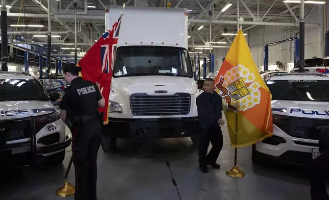 A truck used to transport stolen gold is displayed at a press conference regarding Project 24K a joint investigation into the theft of gold from Pearson International Airport, in Brampton, Ontario, on Wednesday, April 17, 2024. (Arlyn McAdorey/The Canadian Press via AP)