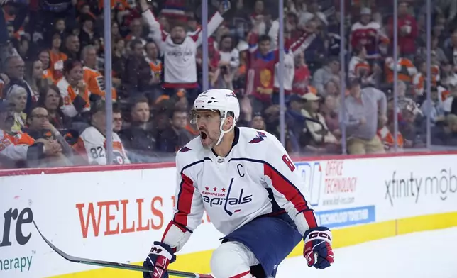 Washington Capitals' Alex Ovechkin reacts after scoring a goal during the first period of an NHL hockey game against the Philadelphia Flyers, Tuesday, April 16, 2024, in Philadelphia. (AP Photo/Matt Slocum)