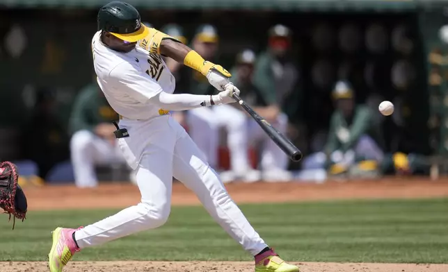 Oakland Athletics' Esteury Ruiz hits a two-run home run against the St. Louis Cardinals during the third inning of a baseball game in Oakland, Calif., Wednesday, April 17, 2024. (AP Photo/Jeff Chiu)
