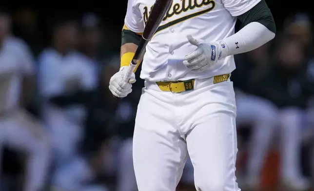 Oakland Athletics' Seth Brown reacts after striking out against the St. Louis Cardinals to end the fourth inning of a baseball game Monday, April 15, 2024, in Oakland, Calif. (AP Photo/Godofredo A. Vásquez)