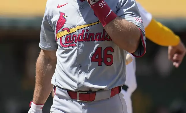 St. Louis Cardinals' Paul Goldschmidt walks to the dugout after striking out against the Oakland Athletics during the seventh inning of a baseball game in Oakland, Calif., Wednesday, April 17, 2024. (AP Photo/Jeff Chiu)
