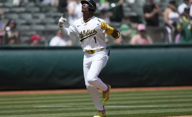 Oakland Athletics' Esteury Ruiz reacts after hitting a two-run home run during the third inning of a baseball game against the St. Louis Cardinals in Oakland, Calif., Wednesday, April 17, 2024. (AP Photo/Jeff Chiu)