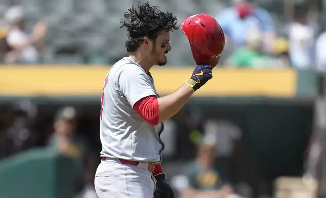 St. Louis Cardinals' Nolan Arenado reacts after striking out during the fifth inning of the team's baseball game against the Oakland Athletics in Oakland, Calif., Wednesday, April 17, 2024. (AP Photo/Jeff Chiu)