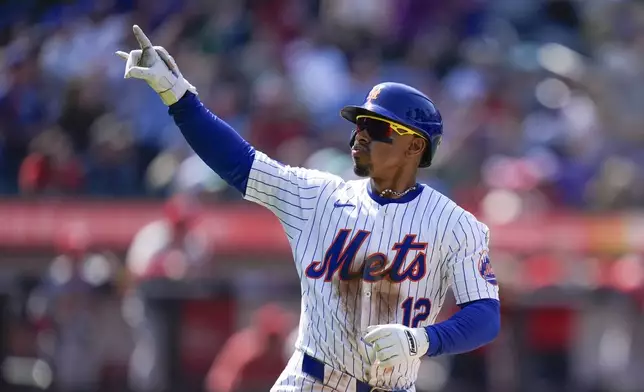 New York Mets' Francisco Lindor reacts after hitting a solo home run during the sixth inning of a baseball game against the St. Louis Cardinals at Citi Field, Sunday, April 28, 2024, in New York. (AP Photo/Seth Wenig)