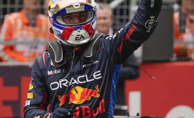 Red Bull driver Max Verstappen of the Netherlands waves after winning the sprint race at the Chinese Formula One Grand Prix at the Shanghai International Circuit, Shanghai, China, Saturday, April 20, 2024. (AP Photo/Andy Wong)
