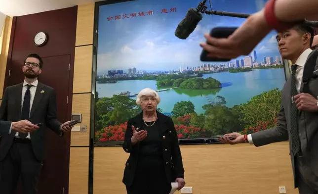 U.S. Treasury Secretary Janet Yellen, center, speaks to the journalists after meeting with Chinese Vice Premier He Lifeng, not shown, at the Guangdong Zhudao Guest House in southern China's Guangdong province, Saturday, April 6, 2024. (AP Photo/Andy Wong, Pool)