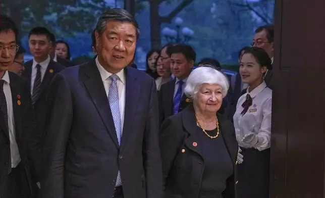 U.S. Treasury Secretary Janet Yellen, right, and Chinese Vice Premier He Lifeng arrive to a bilateral meeting at the Guangdong Zhudao Guest House in southern China's Guangdong province, Saturday, April 6, 2024. (AP Photo/Andy Wong, Pool)