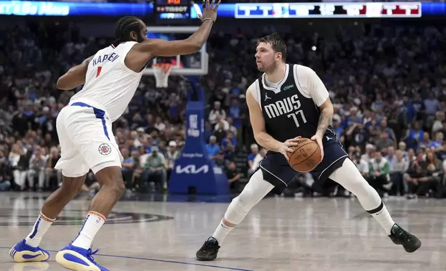 Dallas Mavericks guard Luka Doncic (77) steps back in front of Los Angeles Clippers guard James Harden, left, during the second half of Game 4 of an NBA basketball first-round playoff series Sunday, April 28, 2024, in Dallas. (AP Photo/Jeffrey McWhorter)