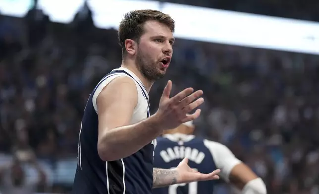 Dallas Mavericks guard Luka Doncic reacts after a call during the first half of Game 4 of an NBA basketball first-round playoff series against the Los Angeles Clippers, Sunday, April 28, 2024, in Dallas. (AP Photo/Jeffrey McWhorter)