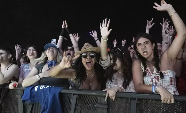 Festivalgoers are seen during the second weekend of the Coachella Valley Music and Arts Festival on Friday, April 19, 2024, at the Empire Polo Club in Indio, Calif. (Photo by Amy Harris/Invision/AP)