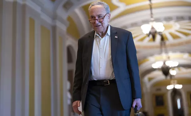 Senate Majority Leader Chuck Schumer, D-N.Y., arrives as the Senate prepares to advance the $95 billion aid package for Ukraine, Israel and Taiwan passed by the House, at the Capitol in Washington, Tuesday, April 23, 2024. (AP Photo/J. Scott Applewhite)