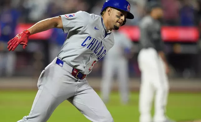 Chicago Cubs' Christopher Morel runs the bases after hitting a two-run home run during the ninth inning of a baseball game against the New York Mets, Monday, April 29, 2024, in New York. (AP Photo/Frank Franklin II)