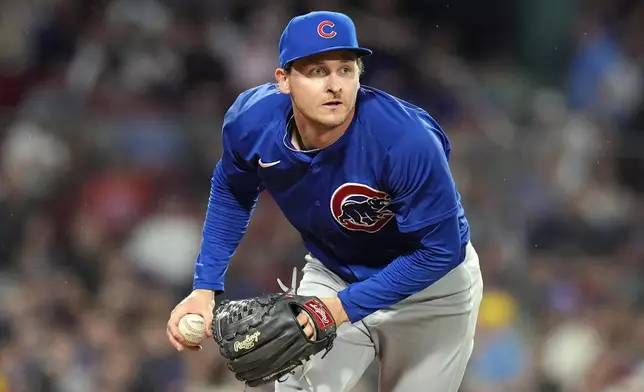 Chicago Cubs starting pitcher Hayden Wesneski fields the ball on the ground out by Boston Red Sox's Tyler O'Neill during the third inning of a baseball game, Sunday, April 28, 2024, in Boston. (AP Photo/Michael Dwyer)