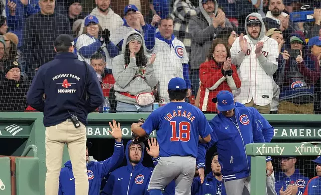 Chicago Cubs starting pitcher Shota Imanaga (18) leaves the field after being relieved during the seventh inning of a baseball game against the Boston Red Sox, Friday, April 26, 2024, in Boston. (AP Photo/Michael Dwyer)