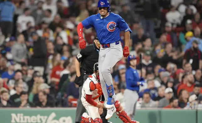 Chicago Cubs' Christopher Morel reacts after fouling off his foot during the fourth inning of a baseball game against the Boston Red Sox, Sunday, April 28, 2024, in Boston. (AP Photo/Michael Dwyer)