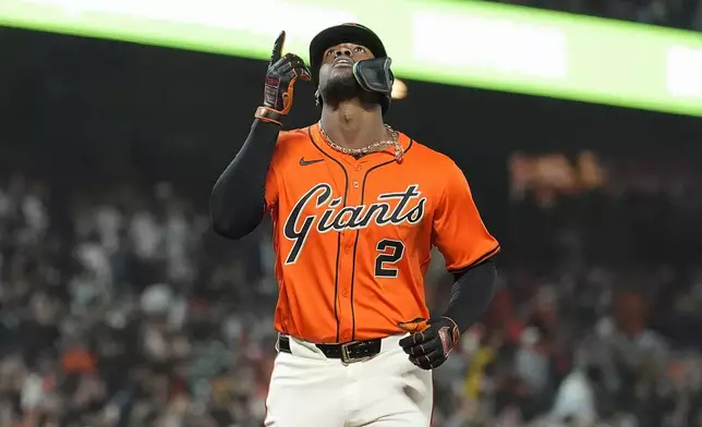 San Francisco Giants' Jorge Soler gestures after hitting a home run against the Arizona Diamondbacks during the fourth inning of a baseball game in San Francisco, Friday, April 19, 2024. (AP Photo/Jeff Chiu)