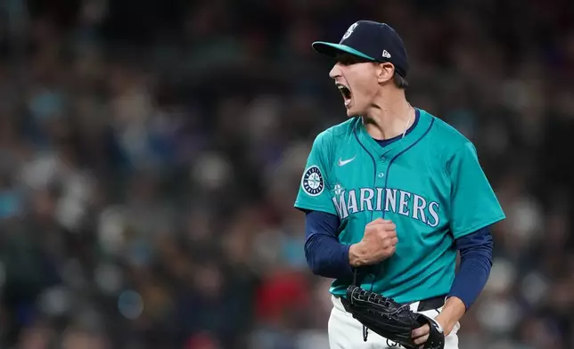 Seattle Mariners starting pitcher George Kirby reacts after striking out Arizona Diamondbacks' Eugenio Suárez to end the top of the seventh inning of a baseball game Saturday, April 27, 2024, in Seattle. (AP Photo/Lindsey Wasson)