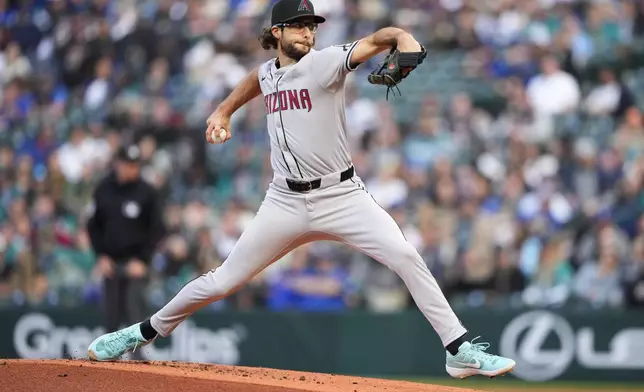 Arizona Diamondbacks starting pitcher Zac Gallen throws to a Seattle Mariners batter during the first inning of a baseball game Friday, April 26, 2024, in Seattle. (AP Photo/Lindsey Wasson)